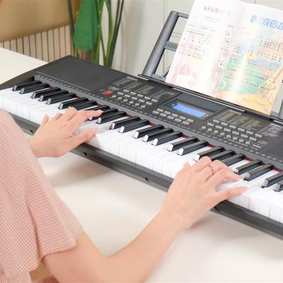 China 2023 new musical instruments 61 keys keyboard LCD screen electronic piano multi-function digital piano electronic piano with MIDI and MP3 for sale