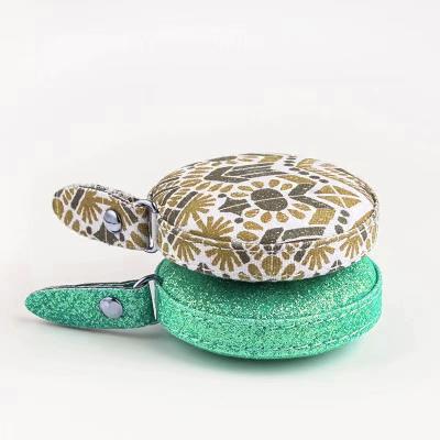 China Mini 60 Inch 1.5 Inch Soft Retractable Soft Custom Logo Body Tape PU Leather Seam Tape Measure Tape for sale