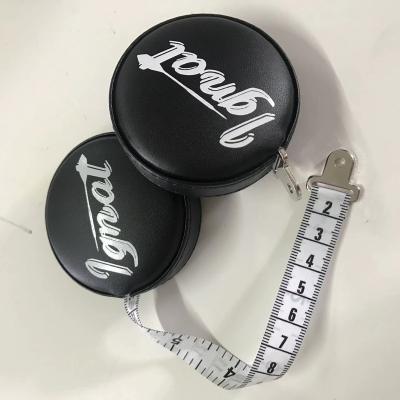 China Mini Retractable Soft Soft PU Leather Sewing Tape Measure Black Custom Black Tape Measure for sale