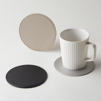 China Sustainable Custom Genuine Leather Coffee Tea Cup Coasters High Grade Drink Coasters For Table for sale