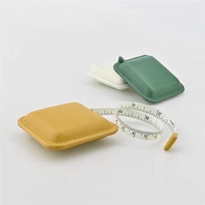 China 1.5m Mini Rectangle 60inch Pink PU Leather Retractable Soft Square Promotional Crate Retractable Tape Measure for sale