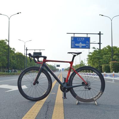 China New 22 design carbon fiber china bicycle factory price 700C road bike gravel whole bike for sale