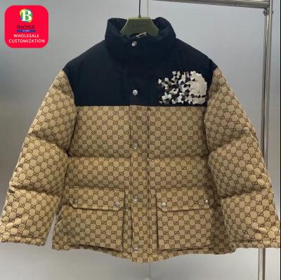 China Baoyue new winter men's casual fashion down jacket cotton face thick North Jacquard women's raincoat with cotton warm coat for sale