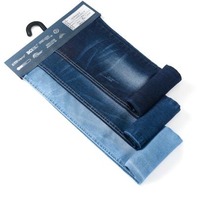 China 9.6oz Blue 10%recycled 26.2%polyester Shrink-Resistant Denim Fabric Price Per Yard for sale