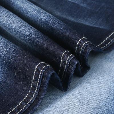 China Antistatic Soft Stretch Cotton Spandex Blue Lightweight Denim Fabric for sale