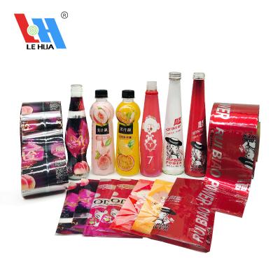 China Metallic PVC/PET Heat Shrink Sleeve Waterproof Red Gold Label Shrink Wrap Metallic Plastic Packaging For Wine Beverage Juice Bottle for sale