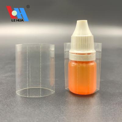 China Waterproof Clear Perforated Pvc Heat Shrink Sleeve Wrap Label For Plastic Liquid Eye Drop Bottles for sale