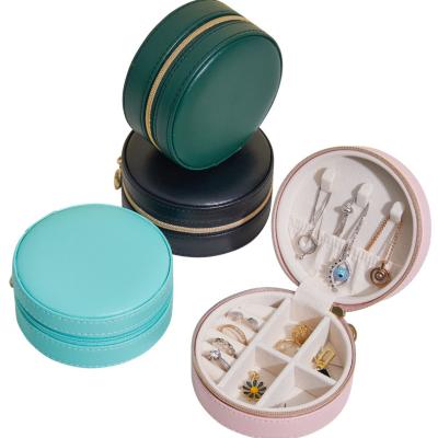 China Luxury Simple Fashion Logo Blue Pink Green Black Velvet Jewelry Storage Jewelery Organizer Portable Small Round Case Travel Leather Jewelry Box for sale