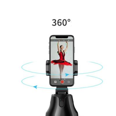 China 37Â ° Vertical Flip Up /Down Flexible Auto Face Tracking Phone Stand Camera Phone Holder 360 Smart Shooting Object Holder for sale