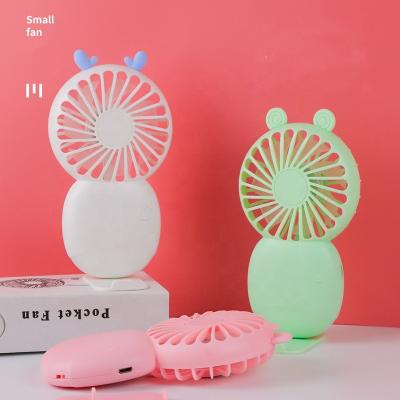 China 2022 New Hotel Mini Pocket Handheld Fan Portable Small Phone Desk Stand USB Charging Mini Fan for sale