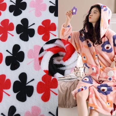 China Super Soft Viable AnimatedSup 100% Polyester Printed Pattern Flannel Fabric And New Style Plush Flannel Fleece For Blanket And Garment for sale