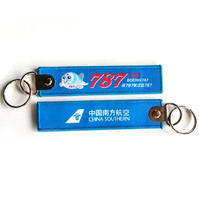 China Fashionable Personalized Airplane Aviation Tags Fabric Key Chain Custom Woven Key Chain for sale