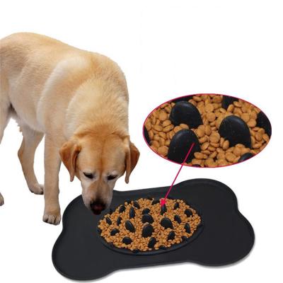 China Sustainable Food Grade Bone Shaped Slow Feeder Bowl Silicone Pet Feeding Mat For Dog for sale