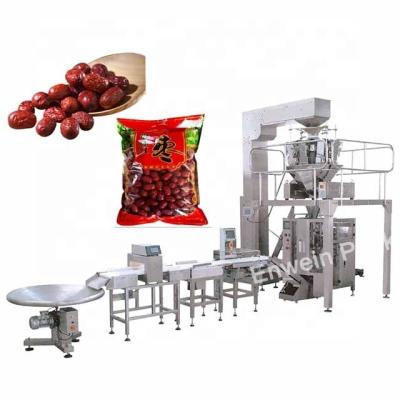 China The red multifunctional dry food packaging dates packing machine weigher the dates bag weighing machine for sale