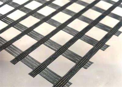 China Self Adhesive Bitumen Coated Knitted Glass Fiber Geogrid for sale