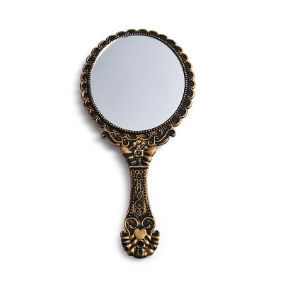 China Custom Hot Selling Personalized Antique Portable Metal Makeup Mirror Hand Held Mirror From Amazon for sale