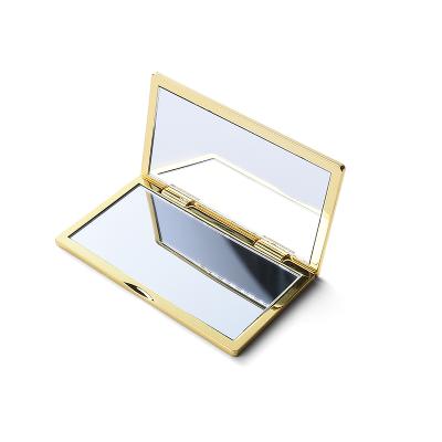 China Double Sides Custom Upscale Gold Double Sides Shell Rectangle Folding Metal Make Up Mirror With Logo for sale