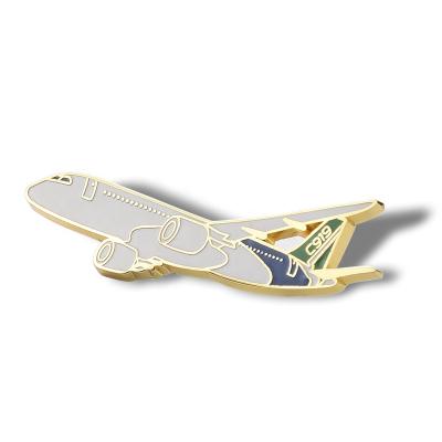 China High Quality China Metal Badge Airplane Shaped Custom Enamel Pin With Embossed Gold Metal Logo for sale