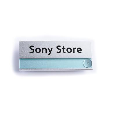 China Custom Lapel Lconic Nameplate Sky Blue Metal Silkscreen Pin Name Badge Identity Nameplate for sale