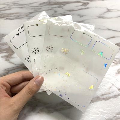 China Clear Bopp Holographic Silver Sticker Rose Gold Foil Sticker Sheet Custom Adhesive Waterproof for sale