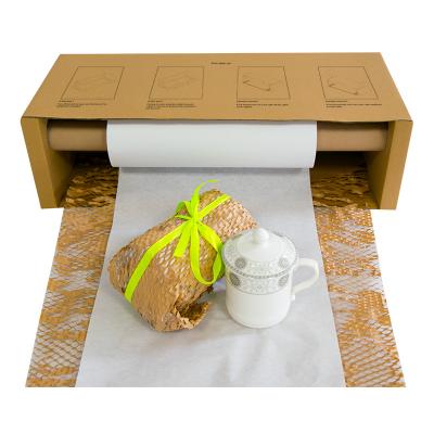 China YJNPACK Recyclable Top Maker Protection Packaging Kraft Roll Cushion Wrap Honeycomb Paper Dispenser for sale