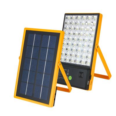 China Residential Portable 2 in 1 Solar Panel Flood Light Multifunctional Rechargeable Emergency Work Light Solar Lights for sale