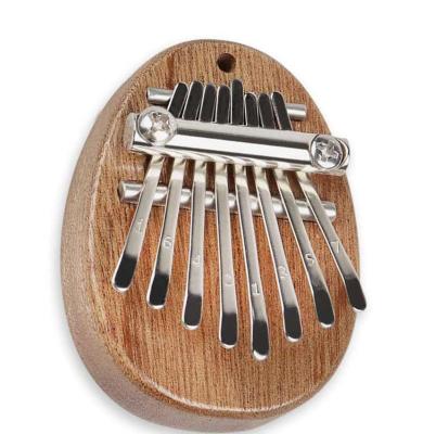 China Sapele Amazon Hot Sale Finger Piano 8 Inch Mini Kalimba Keys for sale