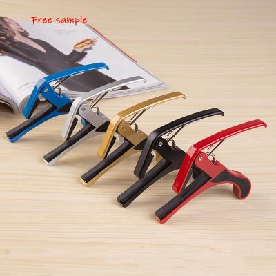 China Free Sample GUITAR Acoustic Guitar Shark Capo Amazon Zinc Alloy High Quality Colorful Metal Best For Acoustic Guitar for sale