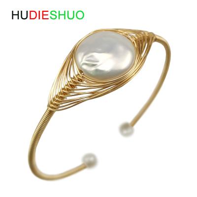 China BOHEMIA Hot Selling Large Baroque Single Bead Hand - Woven Adjustable Open Bracelet for sale