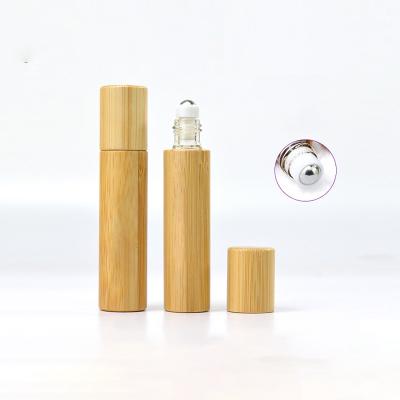 China Bamboo Clear Transparent Glass Bottle Perfume 10ml 15ml Roll On Roller Glass Bottle With Lid And Bamboo Rollers for sale