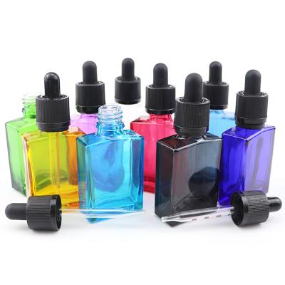 China New Style 10ml 15ml 30ml 50ml Glass Bottle Colorful Square Shape Perfume Oil Dropper Glass Bottle For Essence Oils for sale