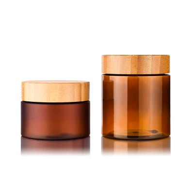 China Plastic Jar New Product Nature Frosted Amber Clear Plastic Body Butter Pet Cosmetic Cream Jar With Bamboo Lid for sale