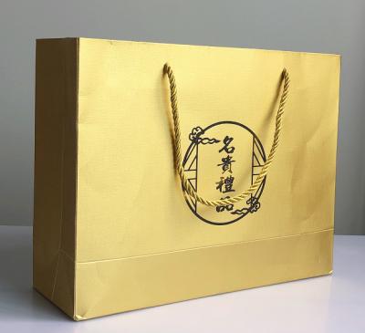 China Recycled Materials Recycled Multifunctional Paper Gift Bag With Handles Specialty Paper Packaging Bag for sale