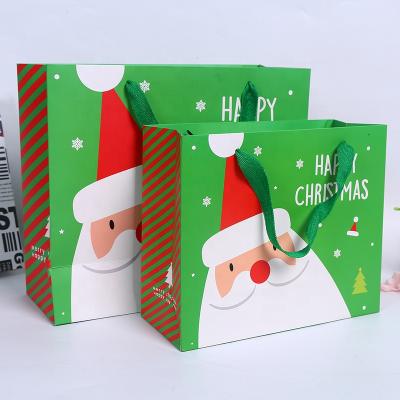 China Factory Safe Wholesale Custom Size Cartoon Paper Bags Christmas Gift Wrapping Biodegradable Recyclable Foldable Bag for sale