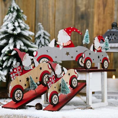 China New Wooden Christmas Santa Claus Decorations With Small Trees Driving Wooden Christmas Ornaments for sale