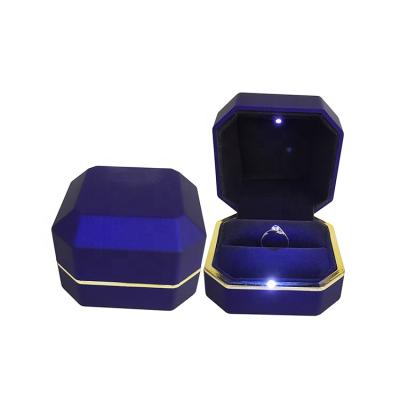 China Custom best-selling edges and corners from the luxury manufacturer the eight led light jewelry gift packaging ring box for sale