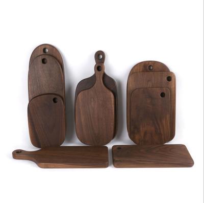 China Sustainable Different Shape Beeswax Black Walnut Overlay Special Shaped Cut Bread Board for sale