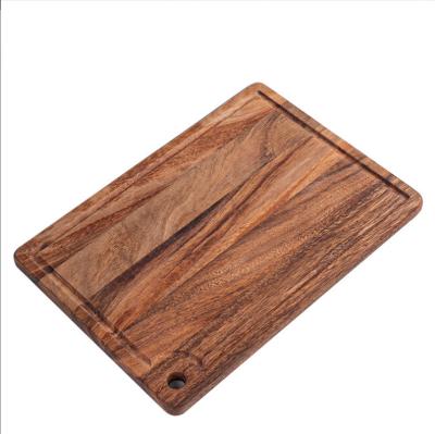 China Sustainable Rectangle Walnut Wooden Breakfast Cutting Board with Handle (3 Styles) for sale