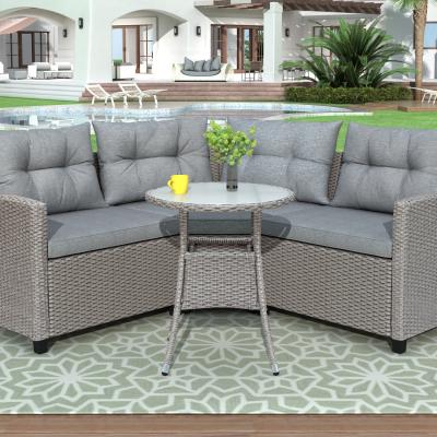 China US CURRENT modern style 4 piece resin wicker patio furniture with round table and gray cushion for sale