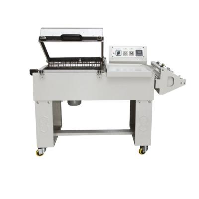 China Beverage 2 in 1 Semi Automatic Shrink Packing Machine Plastic Film Heat Shrink Sealing Machine for sale