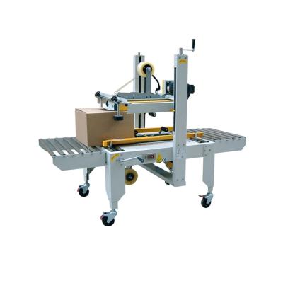 China CLOTHING Carton Box Seal Packaging Machine With Adhesive Tape For Paper Case Closing for sale