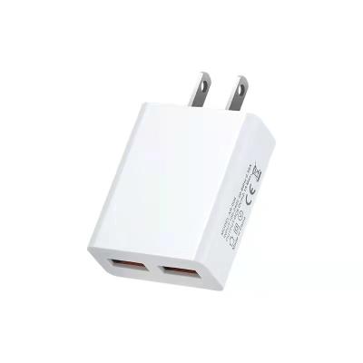 China Universal Quick Power Adapter Travel AC/DC Plug US Smart Match Charging USB Wall Charger For Smart Phone for sale