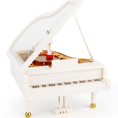 China UCHOME Mini Ballerina Home Piano Shape Plastic Music Box For Gifts for sale