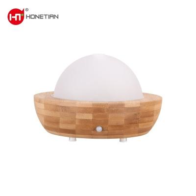 China New Small PP Water Tank Air Humidifier Essential Oil Diffuser Ultrasonic Wooden Grain Base Aroma Diffuser for sale