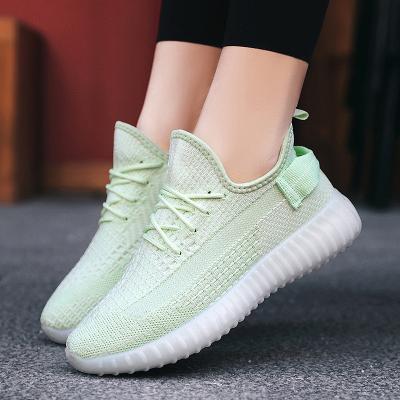 China Fashion Trend JSYA2011-1 Customized Stylish Sport Fly-weave Walking Woman Shoes Unique TPR Ladies Sneakers Shoes Jelly Shoes for sale