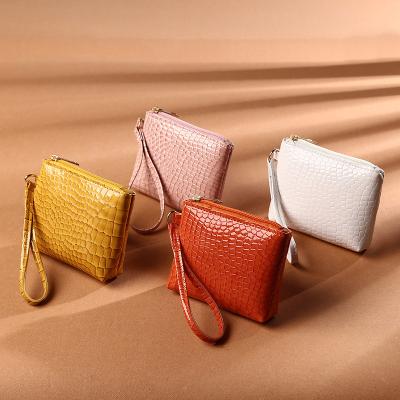 China Retro PU Solid Color Mini Short Zipper Small Wallet Waterproof Portable Clutch Bag for sale