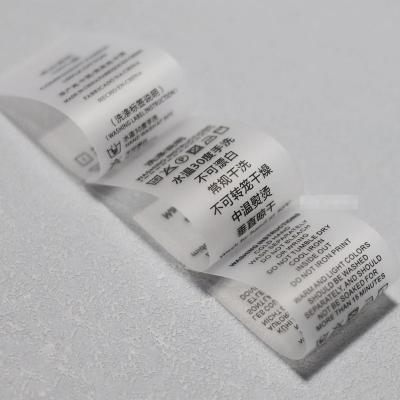 China Free Sample Viable TPU Frosted Transparent Garment Wash Wear Label Underwear Active PVC Heat Transfer Printed Label for sale