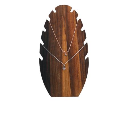 China Ruichen Fashion Selection Black Walnut Necklace Display Rack Eco-friendly Creative Custom Jewelry Display Rack for sale