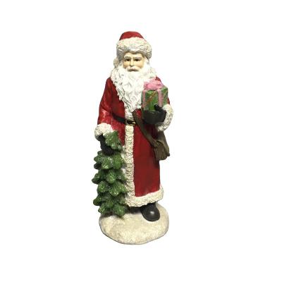 China Europe Resin Christmas Santa With Tree And Present Figurine for sale