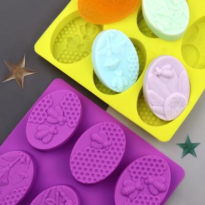 China 6 Hole Sustainable Soap Molds Silica Gel Oval Bee Shape Handmade Soap Mold Portable Unique Soap Making Tools for sale